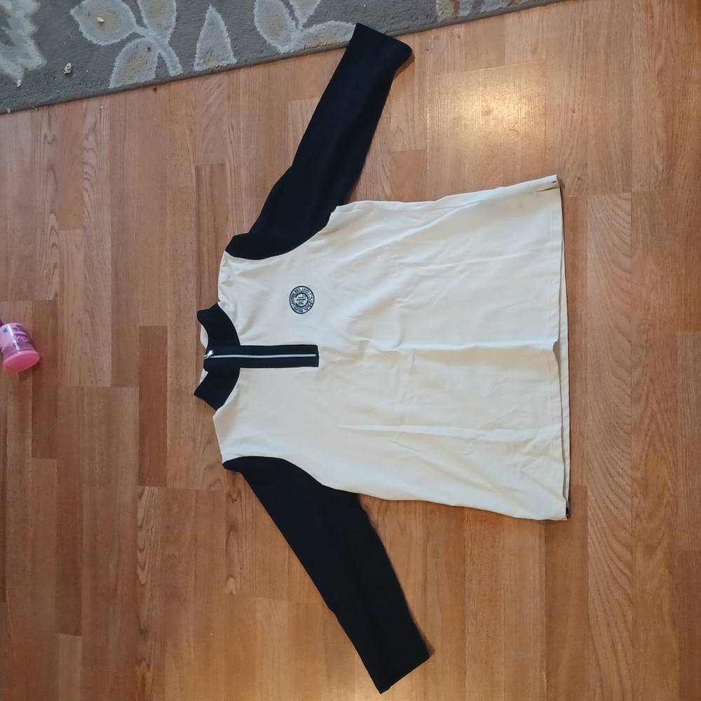 Womens Ralph Lauren eggshell color shirt.